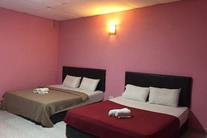 Imagen de la habitación del Hotel Super OYO 90039 Coop Hotel Kangar. Foto 4