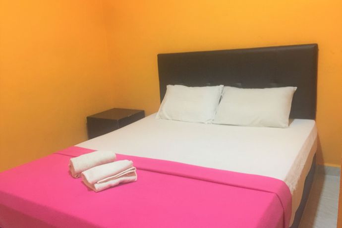 Imagen de la habitación del Hotel Super OYO 90039 Coop Hotel Kangar. Foto 5