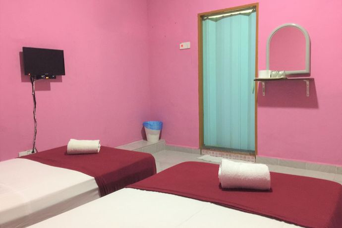 Imagen de la habitación del Hotel Super OYO 90039 Coop Hotel Kangar. Foto 6