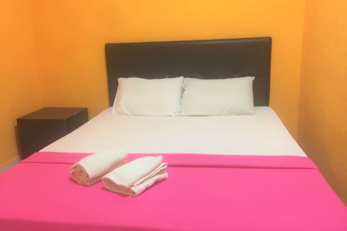 Imagen de la habitación del Hotel Super OYO 90039 Coop Hotel Kangar. Foto 7