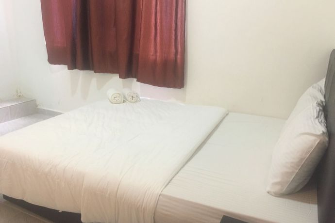 Imagen de la habitación del Hotel Super OYO 90039 Coop Hotel Kangar. Foto 8