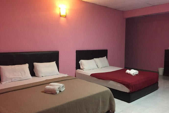 Imagen de la habitación del Hotel Super OYO 90039 Coop Hotel Kangar. Foto 9