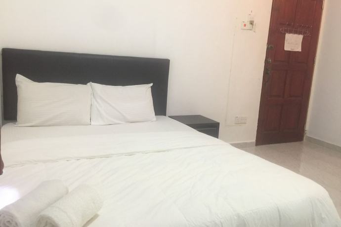 Imagen de la habitación del Hotel Super OYO 90039 Coop Hotel Kangar. Foto 10