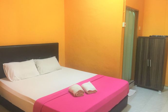 Imagen de la habitación del Hotel Super OYO 90039 Coop Hotel Kangar. Foto 11