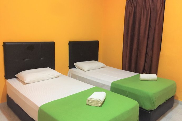 Imagen de la habitación del Hotel Super OYO 90039 Coop Hotel Kangar. Foto 12