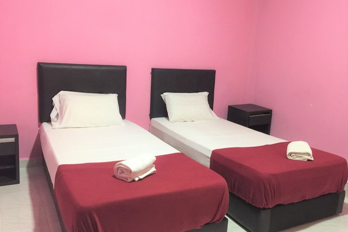 Imagen de la habitación del Hotel Super OYO 90039 Coop Hotel Kangar. Foto 13