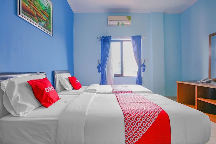 Imagen de la habitación del Hotel Super OYO 90072 Apri Inn Syariah. Foto 2