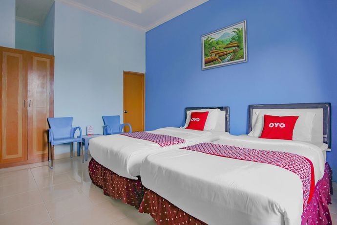 Imagen de la habitación del Hotel Super OYO 90072 Apri Inn Syariah. Foto 3