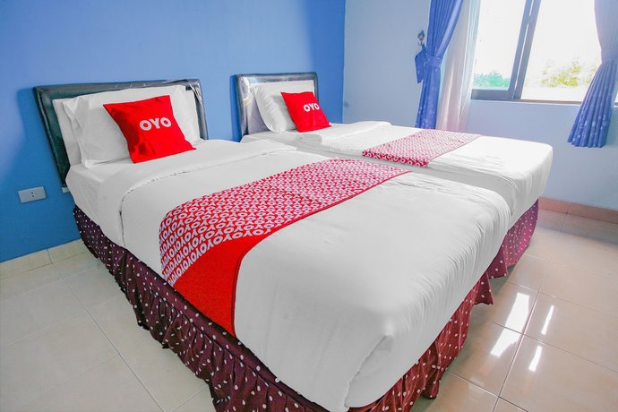 Imagen de la habitación del Hotel Super OYO 90072 Apri Inn Syariah. Foto 5