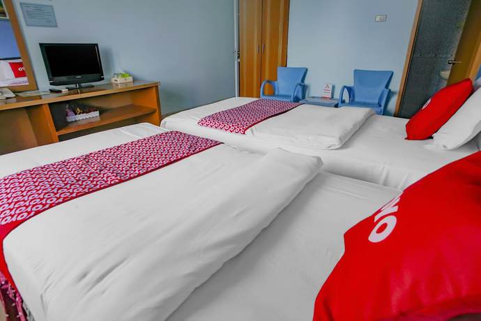 Imagen de la habitación del Hotel Super OYO 90072 Apri Inn Syariah. Foto 7