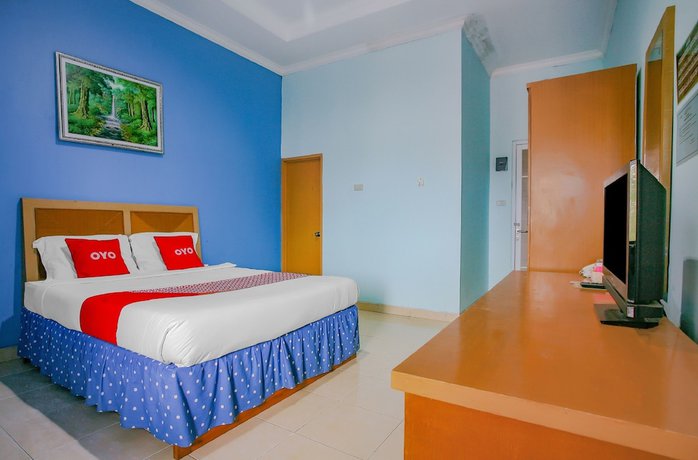 Imagen de la habitación del Hotel Super OYO 90072 Apri Inn Syariah. Foto 9