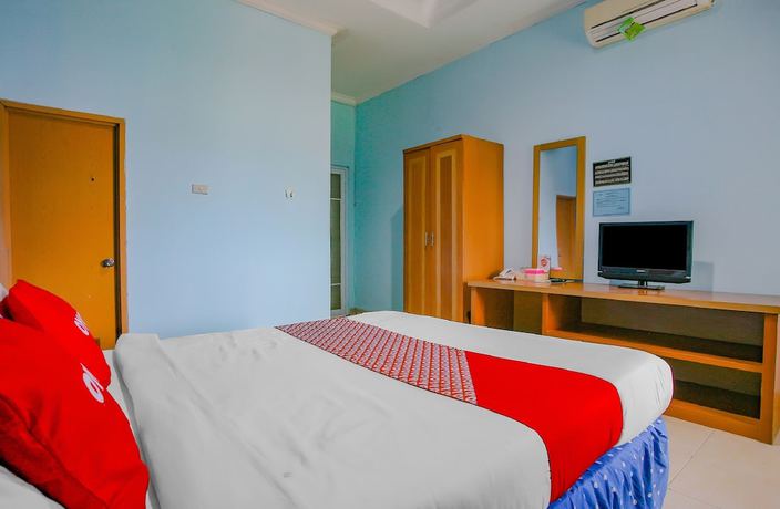 Imagen de la habitación del Hotel Super OYO 90072 Apri Inn Syariah. Foto 10