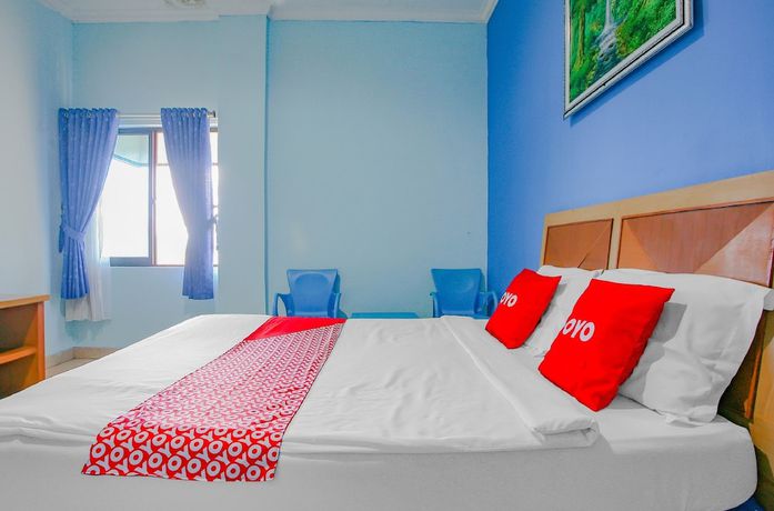 Imagen de la habitación del Hotel Super OYO 90072 Apri Inn Syariah. Foto 11