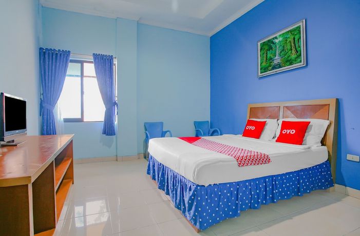Imagen de la habitación del Hotel Super OYO 90072 Apri Inn Syariah. Foto 12