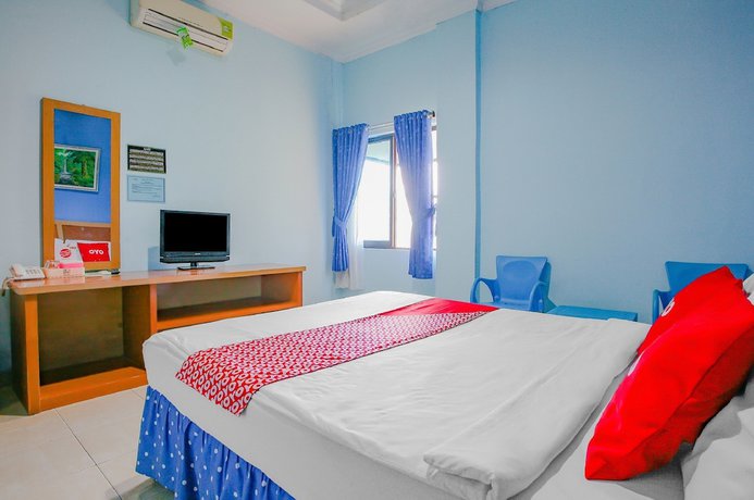 Imagen de la habitación del Hotel Super OYO 90072 Apri Inn Syariah. Foto 13