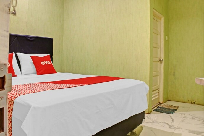 Imagen de la habitación del Hotel Super OYO 90112 Permata Inn. Foto 18