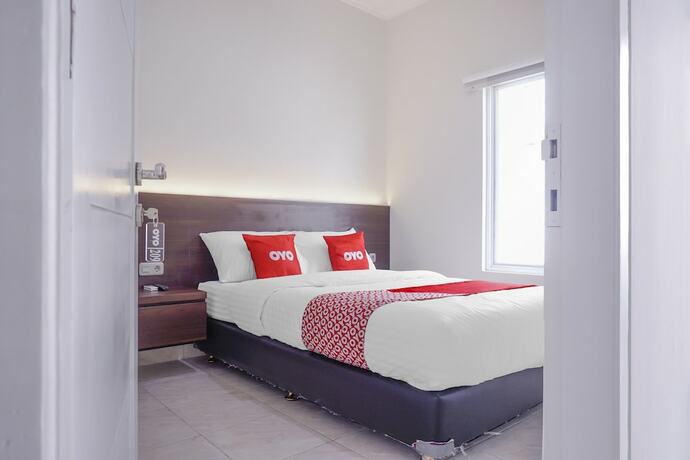 Imagen de la habitación del Hotel Super OYO 90115 Near Pasar Baru. Foto 19