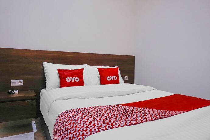 Imagen de la habitación del Hotel Super OYO 90115 Near Pasar Baru. Foto 20