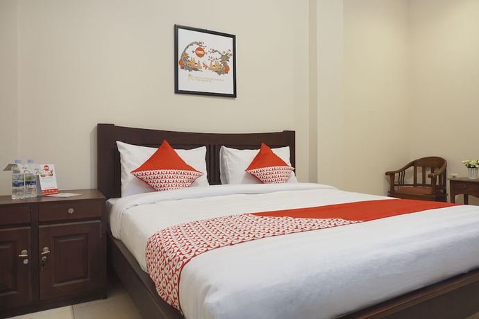 Imagen de la habitación del Hotel Super OYO 902 Pondok Anggun. Foto 2