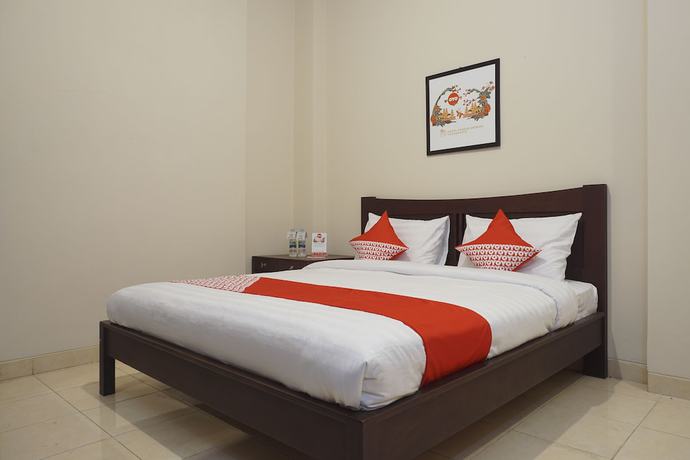 Imagen de la habitación del Hotel Super OYO 902 Pondok Anggun. Foto 4