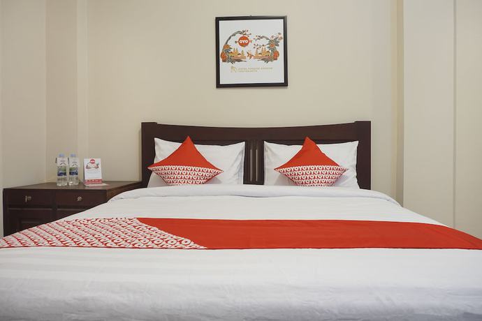 Imagen de la habitación del Hotel Super OYO 902 Pondok Anggun. Foto 5
