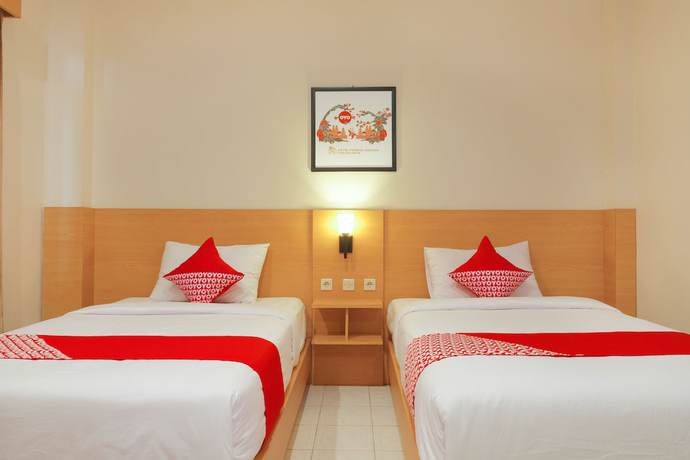 Imagen de la habitación del Hotel Super OYO 902 Pondok Anggun. Foto 6