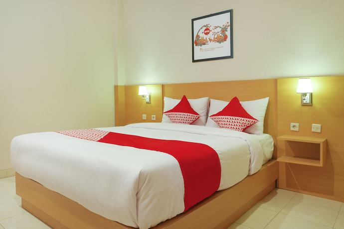 Imagen de la habitación del Hotel Super OYO 902 Pondok Anggun. Foto 10