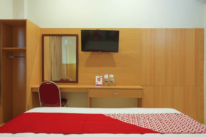 Imagen de la habitación del Hotel Super OYO 902 Pondok Anggun. Foto 11