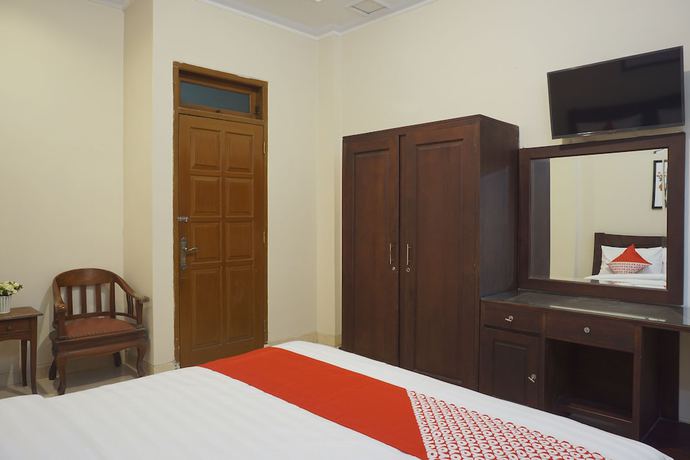 Imagen de la habitación del Hotel Super OYO 902 Pondok Anggun. Foto 13