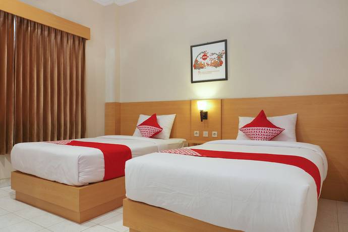 Imagen de la habitación del Hotel Super OYO 902 Pondok Anggun. Foto 15