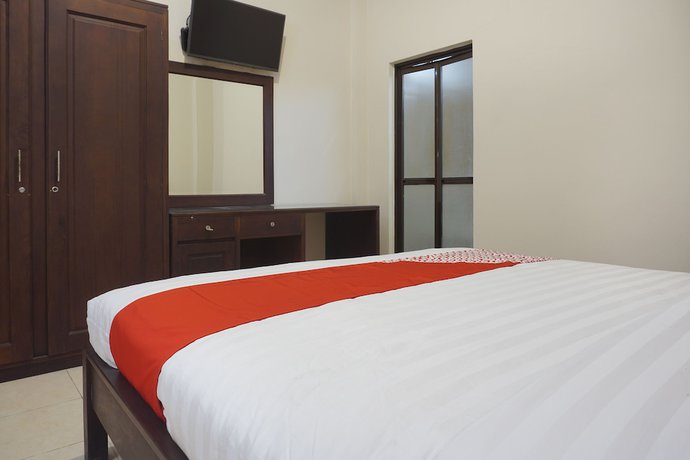 Imagen de la habitación del Hotel Super OYO 902 Pondok Anggun. Foto 16