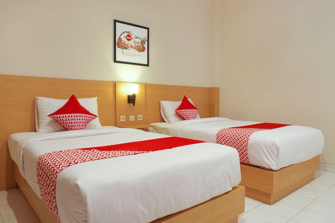 Imagen de la habitación del Hotel Super OYO 902 Pondok Anggun. Foto 17