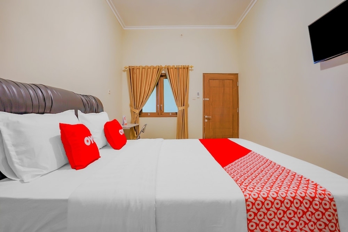 Imagen de la habitación del Hotel Super OYO 90210 Kenari House Syariah. Foto 2
