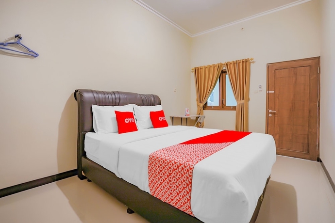Imagen de la habitación del Hotel Super OYO 90210 Kenari House Syariah. Foto 3