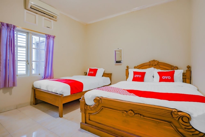 Imagen de la habitación del Hotel Super OYO 90210 Kenari House Syariah. Foto 4