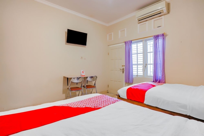 Imagen de la habitación del Hotel Super OYO 90210 Kenari House Syariah. Foto 5