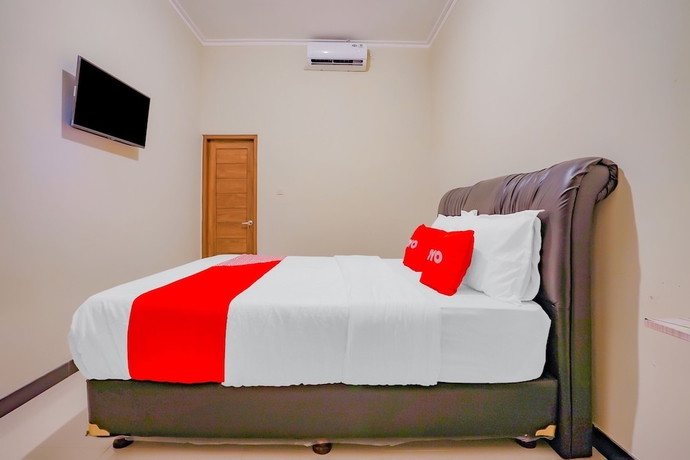 Imagen de la habitación del Hotel Super OYO 90210 Kenari House Syariah. Foto 6