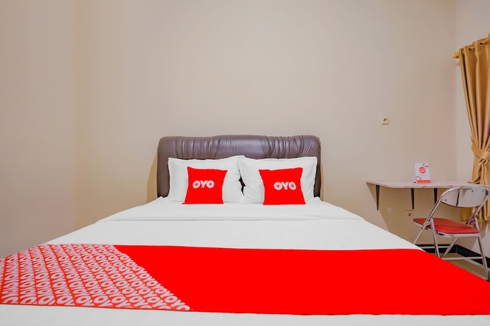 Imagen de la habitación del Hotel Super OYO 90210 Kenari House Syariah. Foto 7