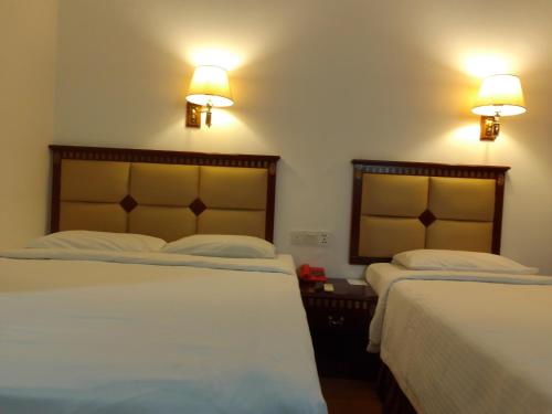 Imagen de la habitación del Hotel Super OYO 90464 Borneo Suites. Foto 19