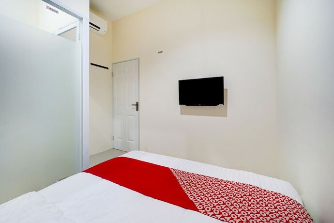 Imagen de la habitación del Hotel Super OYO 90778 River inn Malioboro. Foto 18