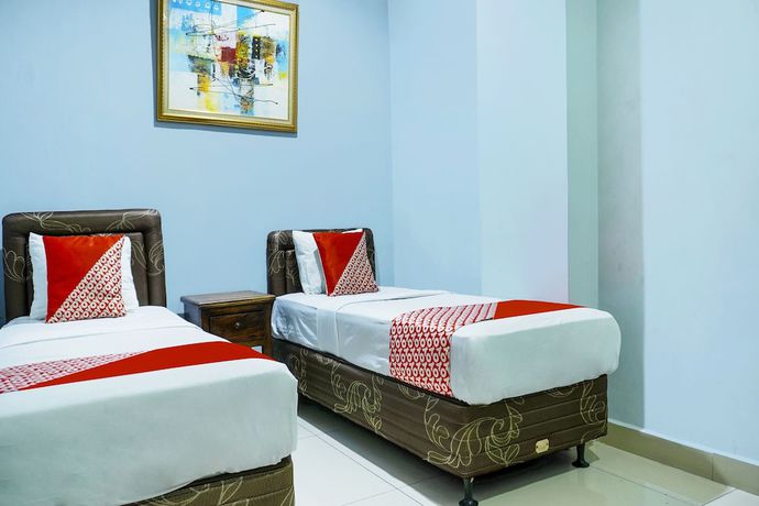 Imagen de la habitación del Hotel Super OYO 91188 Teratai Cikarang. Foto 2