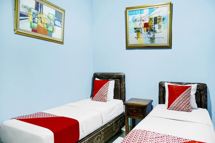 Imagen de la habitación del Hotel Super OYO 91188 Teratai Cikarang. Foto 3