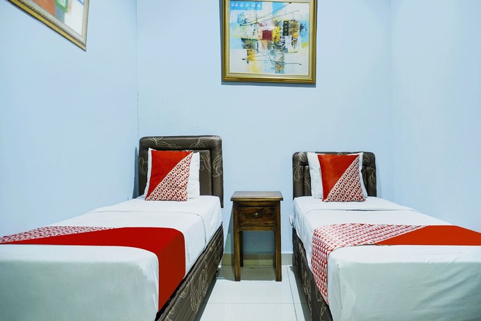 Imagen de la habitación del Hotel Super OYO 91188 Teratai Cikarang. Foto 6