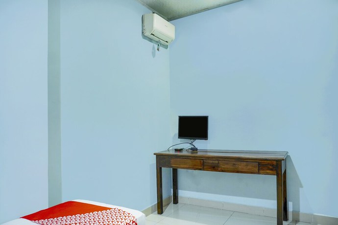 Imagen de la habitación del Hotel Super OYO 91188 Teratai Cikarang. Foto 8