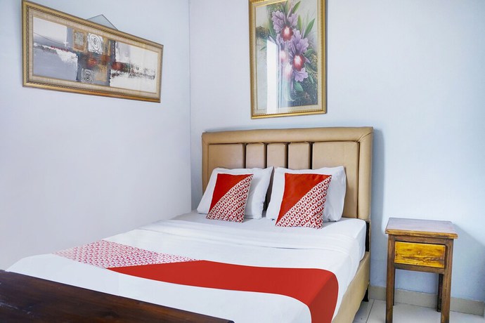 Imagen de la habitación del Hotel Super OYO 91188 Teratai Cikarang. Foto 10