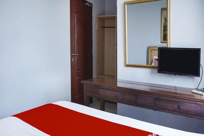 Imagen de la habitación del Hotel Super OYO 91188 Teratai Cikarang. Foto 12