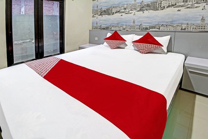 Imagen de la habitación del Hotel Super OYO 91202 Family Guest House Syaria. Foto 3