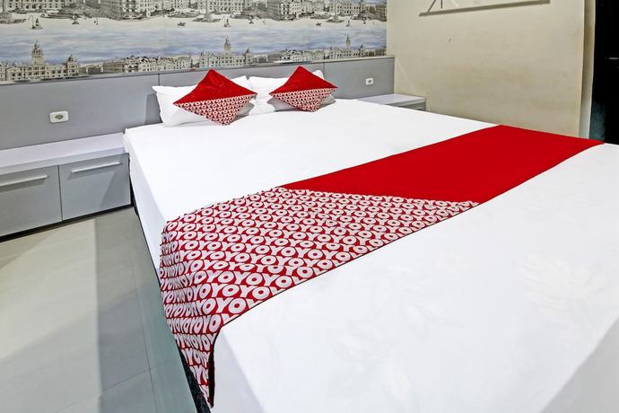 Imagen de la habitación del Hotel Super OYO 91202 Family Guest House Syaria. Foto 4