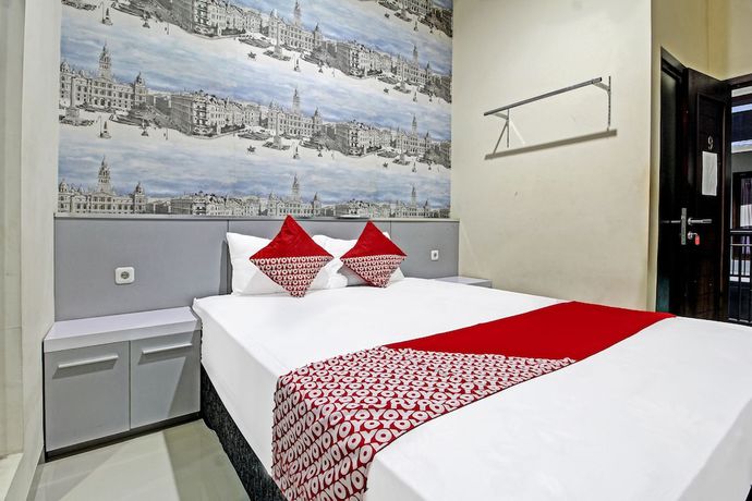 Imagen de la habitación del Hotel Super OYO 91202 Family Guest House Syaria. Foto 5