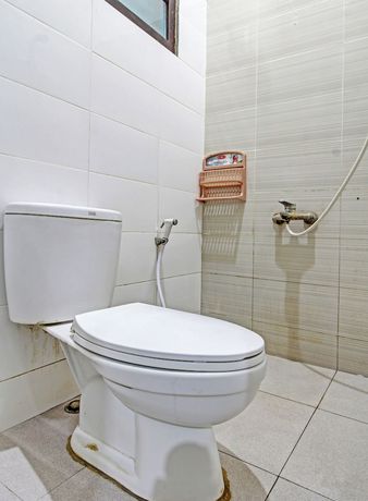 Imagen de la habitación del Hotel Super OYO 91202 Family Guest House Syaria. Foto 17